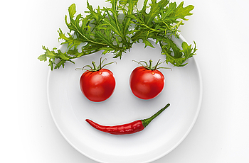Lächelndes Gesicht aus Gemüse